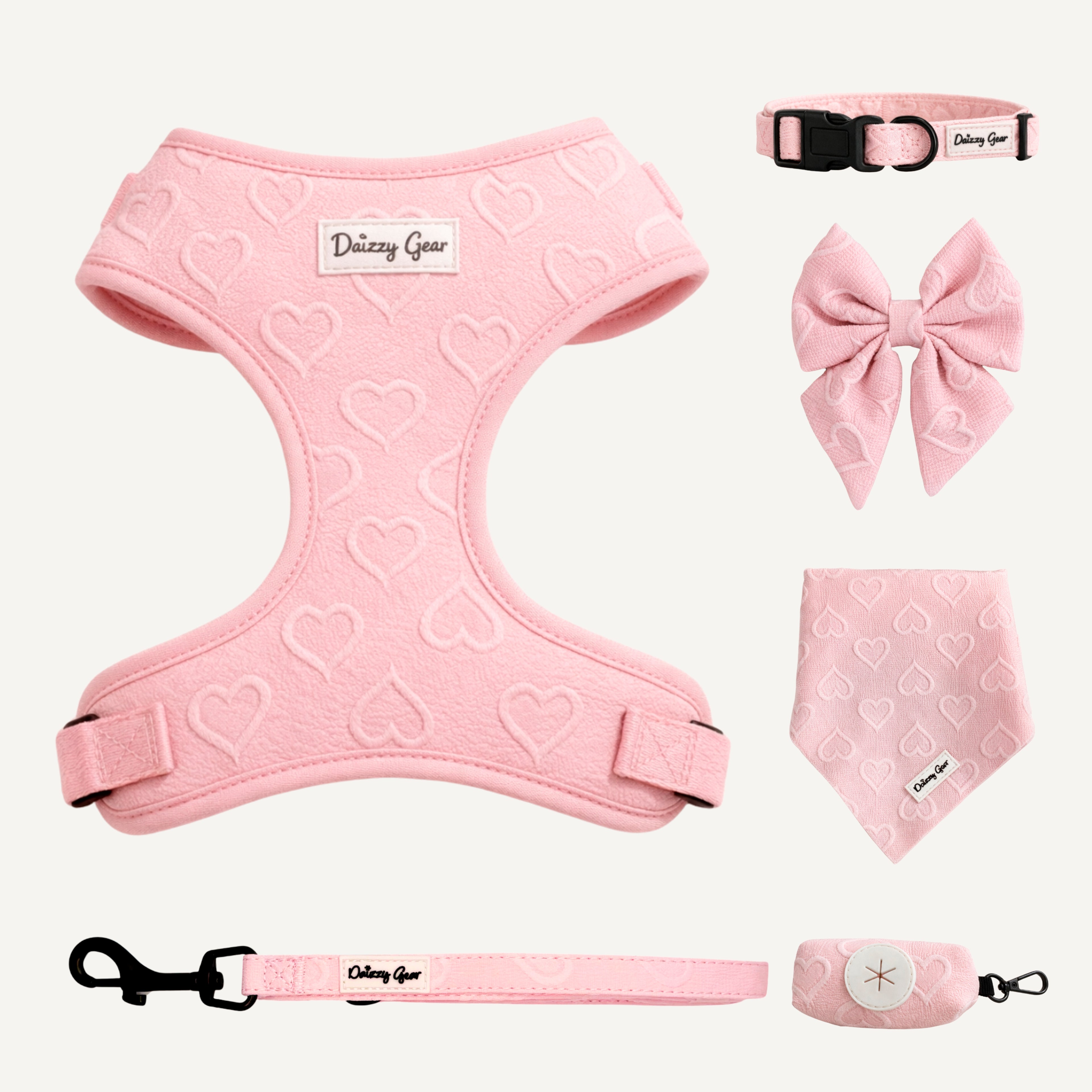 Pink pet harness, collar, bow tie, bandana, and leash set with 'Dazzling Gear' branding on a white background.