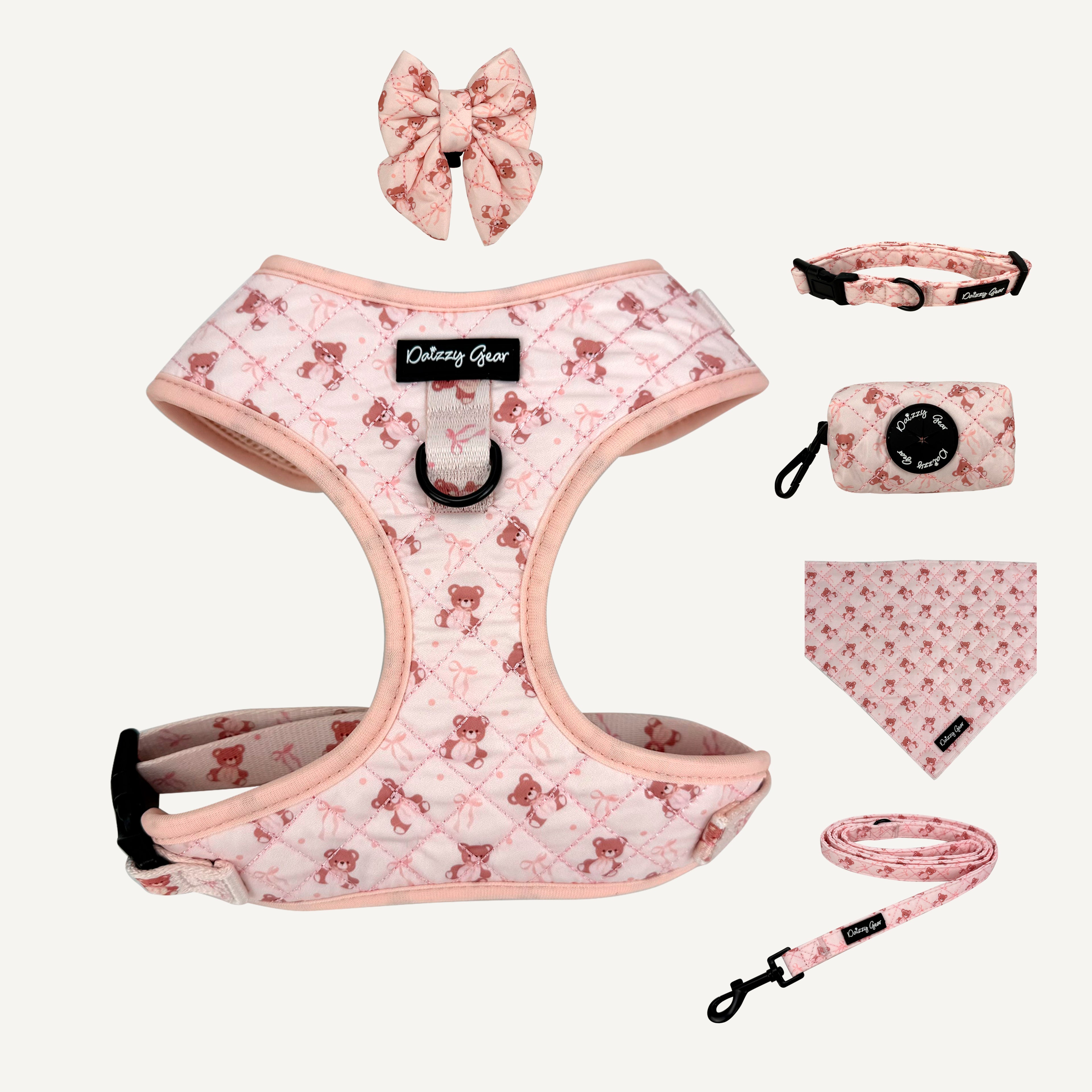 Set of pink pet accessories including a harness, leash, bandana, and headband on a white background.